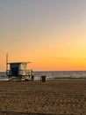 A California Life Guard shack at Sunset on the beach in Santa Monica Royalty Free Stock Photo