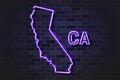 California map glowing neon lamp or glass tube on a black brick wall