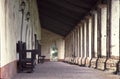 California mission hallway with columns with afternoon sun Royalty Free Stock Photo