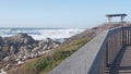 California ocean coast. 17-mile drive wooden boardwalk trail, Pebble beach waves Royalty Free Stock Photo