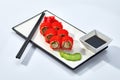 California or Philadelphia sushi rolls set served on a white tray over white background. Japanese cuisine concept Royalty Free Stock Photo