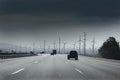 California road with electric windmills aerogenerators Royalty Free Stock Photo