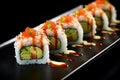 California Roll: Popular Sushi Roll with Crab, Avocado, and Cucumber Royalty Free Stock Photo