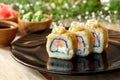 California roll and tuna avocado roll on white plate Royalty Free Stock Photo