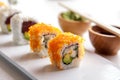 California roll and tuna avocado roll on white plate Royalty Free Stock Photo