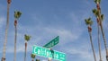 California street road sign on crossroad. Lettering on intersection signpost, symbol of summertime travel and vacations. USA