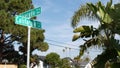California street road sign on crossroad. Lettering on intersection signpost, symbol of summertime travel and vacations. USA