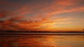 California summertime beach aesthetic, golden sunset. Vivid dramatic clouds over pacific ocean waves. Santa Monica popular resort Royalty Free Stock Photo