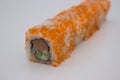 California Sushi Roll with Masago on a White Background Royalty Free Stock Photo