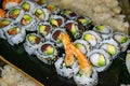 California sushi rolls presented on a skateboard Royalty Free Stock Photo