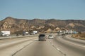 Tow trucks and other vehicles circulating on Interstate Freeway Royalty Free Stock Photo