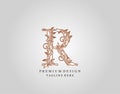 Caligraphic R Letter logo design, elegant floral ornate alphabet design vector