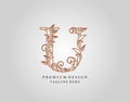 Caligraphic U Letter logo design, elegant floral ornate alphabet design vector