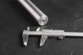A caliper and a metal workpiece on a turner\'s table Royalty Free Stock Photo