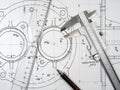 Caliper, ruler and pencil on technical drawings. Royalty Free Stock Photo