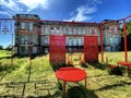 Calke Abbey, Derbyshire, UK. June 2020. Red seating and display outside the Abbey.