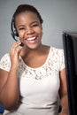 Call center agent talking and laughing Royalty Free Stock Photo