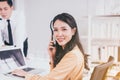 Call center asian woman operator working with headset at office,Employee women smiling face Royalty Free Stock Photo