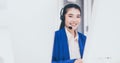 Call center asian woman operator working with headset at office,Smiling employees women Royalty Free Stock Photo