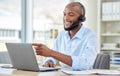 Call center, black man on laptop and video call with headset consulting, customer service or support. African sales man