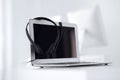 Call center and communication support, customer service help desk. VOIP headset on laptop computer Royalty Free Stock Photo