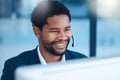 Call center, customer service and worker with computer talking or help in office with crm system. Happy black man, happy Royalty Free Stock Photo