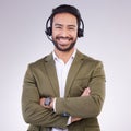Call center employee, man with smile and arms crossed in portrait, headset with mic, CRM and contact us. Communication