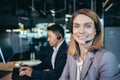 Call center employee provide help to client distantly. Asian male customer services agent with headset working in online store Royalty Free Stock Photo