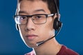 Call center headset on helpful young man Royalty Free Stock Photo