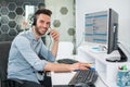 Call center male operator working on computer at office. Royalty Free Stock Photo