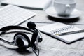 Call center manager work desk with headset and keyboard