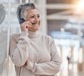 Call center, mature woman and microphone for communication, customer service or thinking of telecom questions Royalty Free Stock Photo