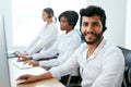 Call Center Operator With Colleagues At Workplace Royalty Free Stock Photo