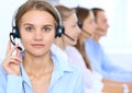 Call center operator in headset while consulting client. Telemarketing or phone sales Royalty Free Stock Photo