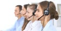 Call center operator in headset while consulting client. Telemarketing or phone sales. Customer service and business Royalty Free Stock Photo