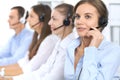 Call center operator in headset while consulting client. Telemarketing or phone sales. Customer service and business Royalty Free Stock Photo