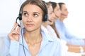 Call center operator in headset while consulting client. Telemarketing or phone sales. Customer service and business Royalty Free Stock Photo