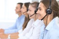 Call center operator in headset while consulting client. Telemarketing or phone sales. Customer service and business Royalty Free Stock Photo