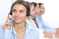 Call center operator in headset while consulting client. Telemarketing or phone sales. Customer service and business Royalty Free Stock Photo