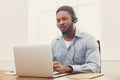 Call center operator man with headset working Royalty Free Stock Photo