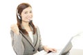 The call center operator who poses happily Royalty Free Stock Photo