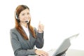 The call center operator who poses happily Royalty Free Stock Photo