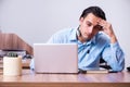 Call center operator working at his desk Royalty Free Stock Photo