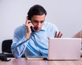 Call center operator working at his desk Royalty Free Stock Photo