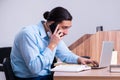 Call center operator working at his desk Royalty Free Stock Photo