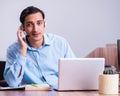 Call center operator working at his desk Royalty Free Stock Photo