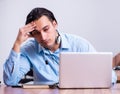 Call center operator working at his desk Royalty Free Stock Photo