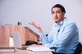 Call center operator working at his desk Royalty Free Stock Photo