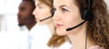 Call center operator.Young beautiful brunette woman in headset. Business concept Royalty Free Stock Photo