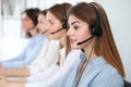 Call center operator.Young beautiful brunette woman in headset. Business concept Royalty Free Stock Photo